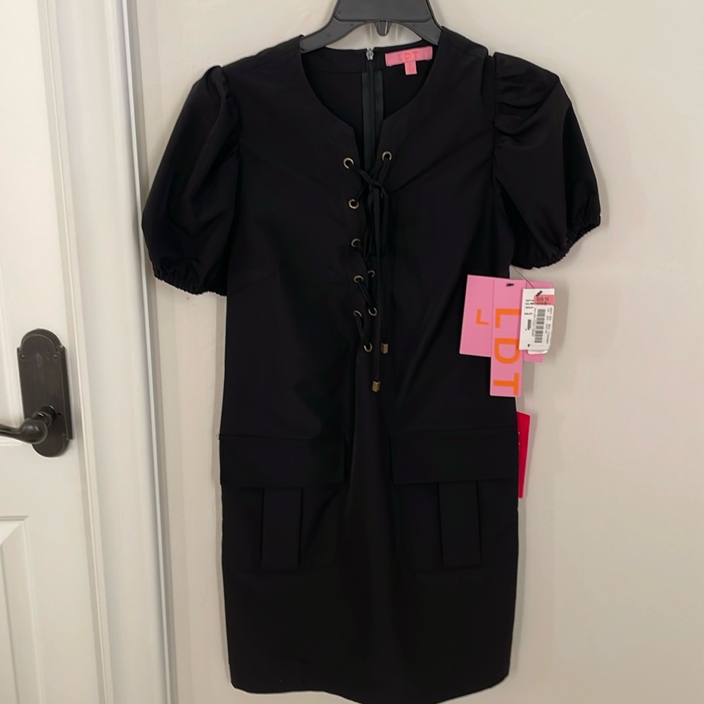 LDT black mini dress with lace up and pocket detail